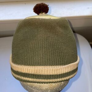 Vintage green & tan knit beanie cap with unique vinyl circle & pom pom on top